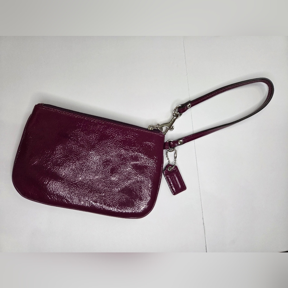 Free With Any Bundle 2+ More Items..Coach Wristlet